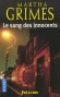 Le sang des innocents - Ange aux boucles d’or, la petite Flora manque à l’appel depuis trois ans.  - GRIMES MARTHA  - Thriller - Martha Grimes