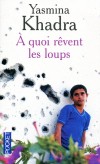 A quoi rêvent les loups - L'évolution tragique et sanglante de l'Algérie à la fin des années 80, à travers l'histoire de Nafa, un jeune chauffeur de maître algérois.- KHADRA YASMINA  - Roman - Khadra Yasmina - Libristo